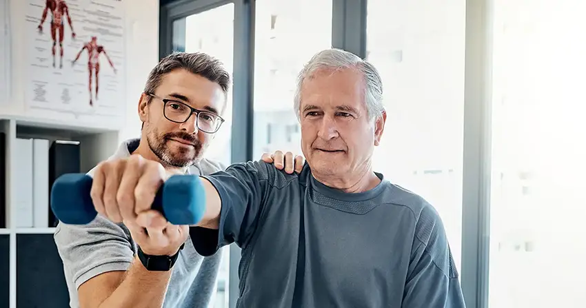 physical therapy patient using a weight at premier injury care